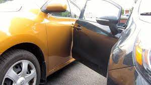 Opening Car Door Hitting Another Car