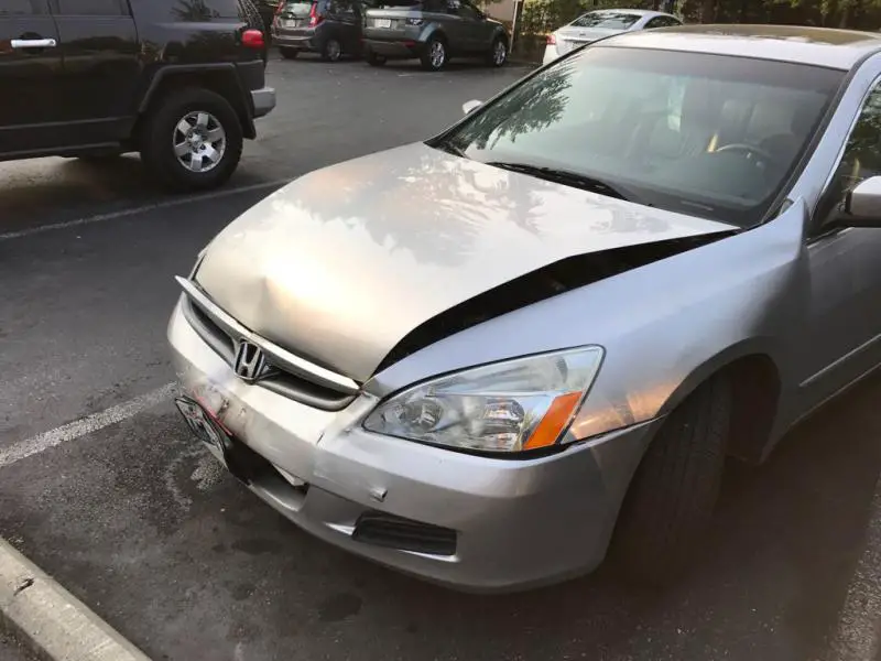 How To Fix A Buckled Car Hood