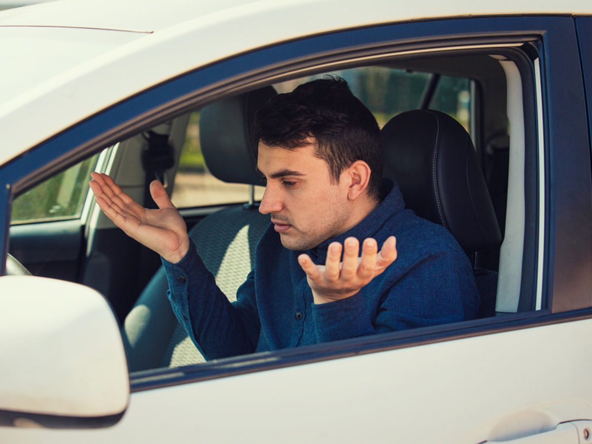 Angry Young Man Driver, Pissed Off Shaking Hands And Shrugging S