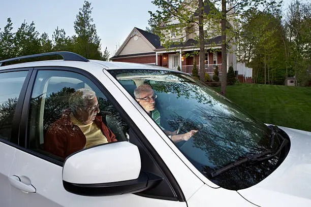 Person Sitting In Car Outside My House