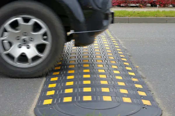 Speed Bump On A Road When And Car